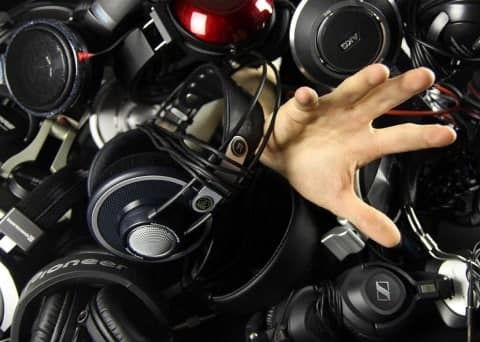 Hand getting through the headsets